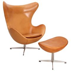 Egg Chair and Its Ottoman Designed by Jacobsen, Edited by Fritz Hansen in 1958