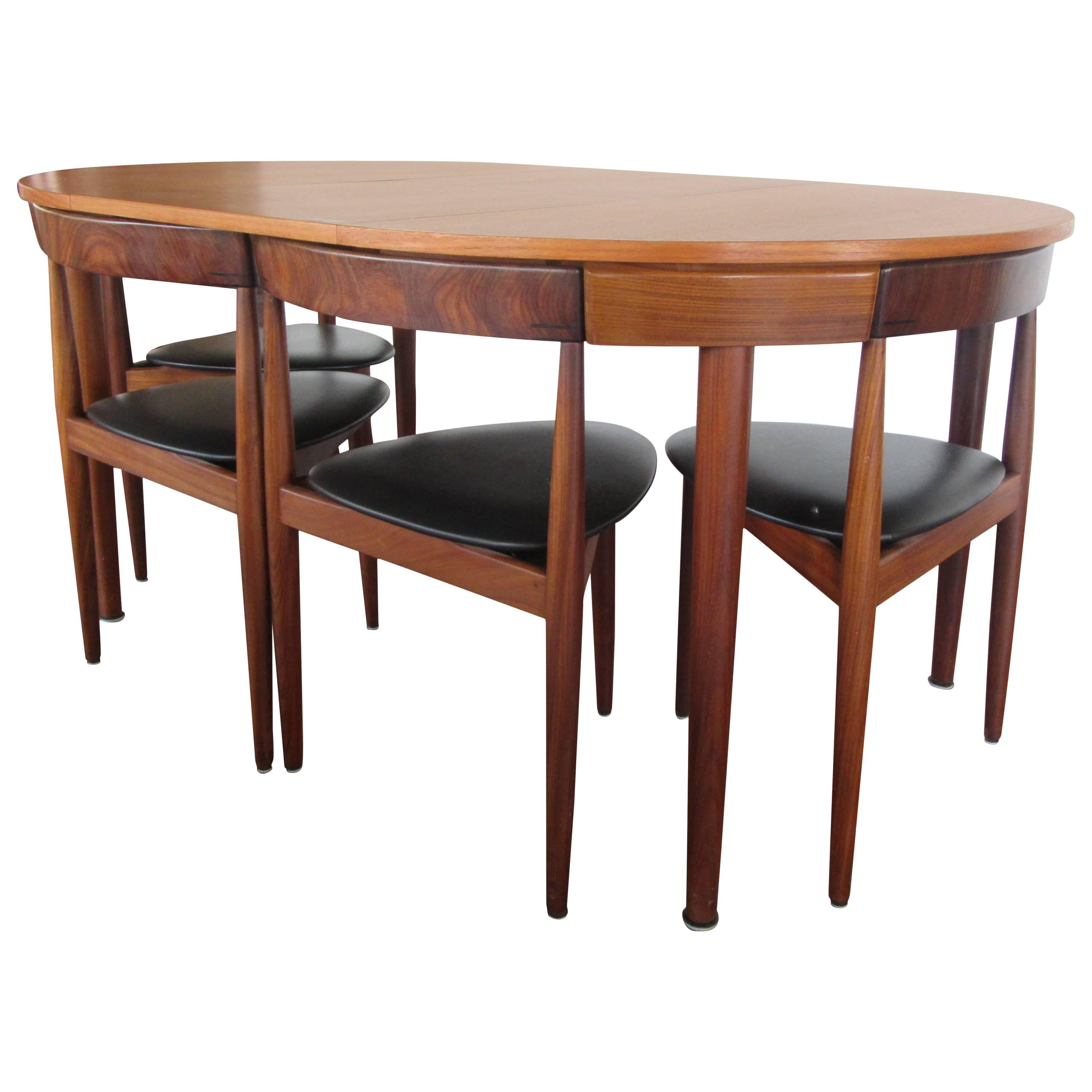 Rare Hans Olsen Teak Table with Leaf and Six Chairs That Tuck under Table at 1stDibs tuck