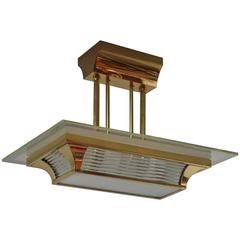 A Fine French Art Deco Brass and Glass Chandelier by Petitot