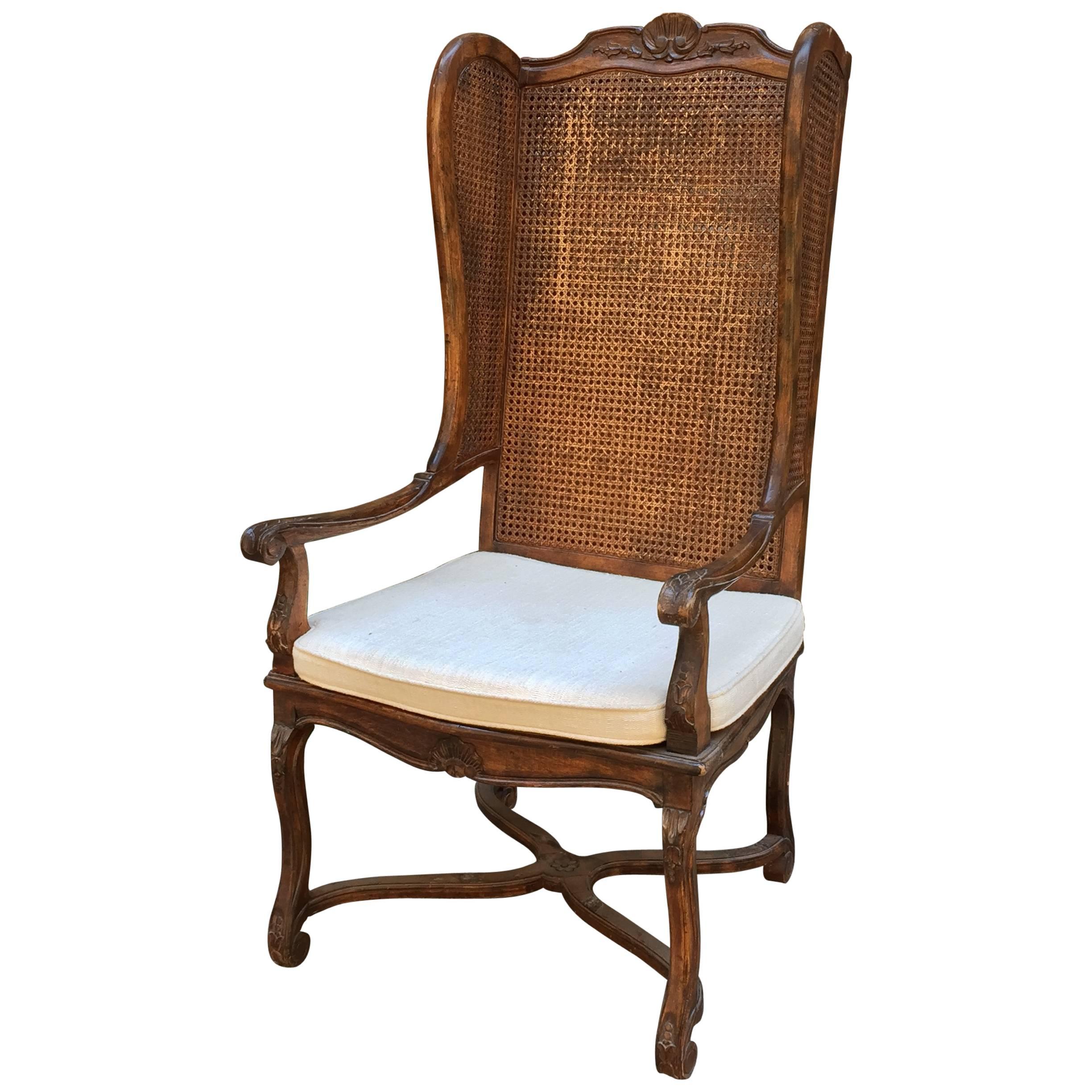 Carved and Caned Wing Chair