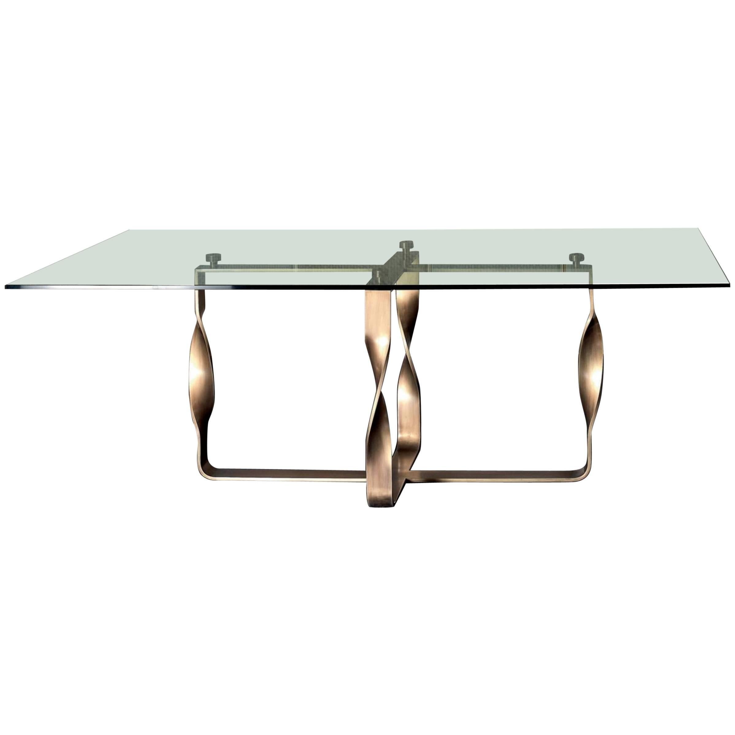 Table torsade pieds en bronze et plateau en verre