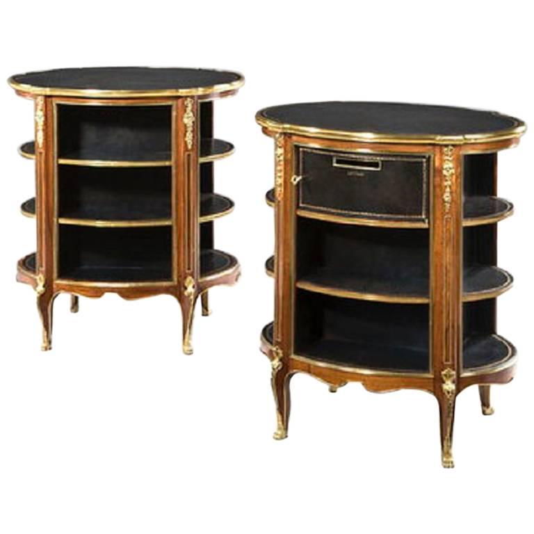 Pair of Open Library Bookcases Are Inset with Oval Black Leather Tops For Sale
