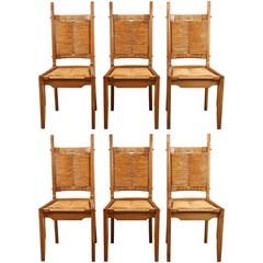 Set of Six French Oak and Rush Chairs by Maurice Pre