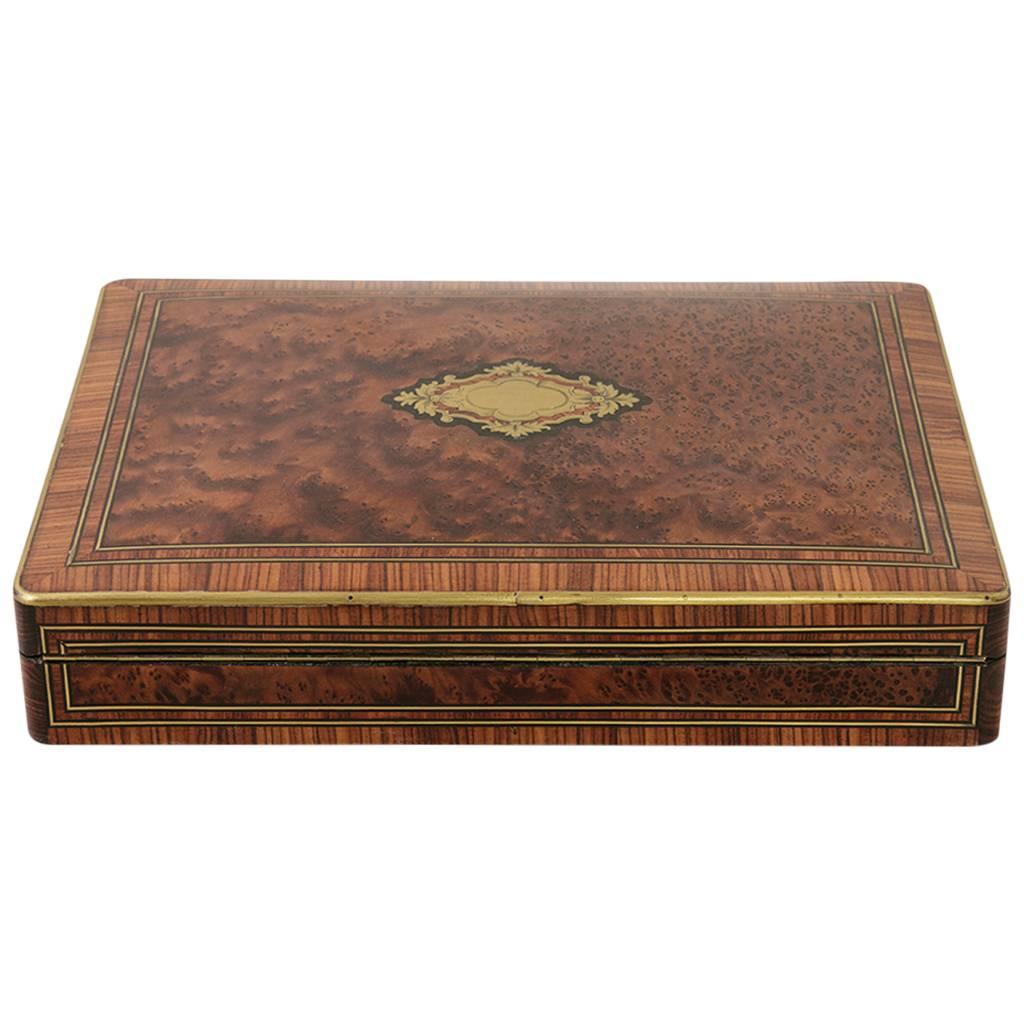 This incredibly rare nineteenth century marquetry game box is made of rosewood, ebony, and plum pudding mahogany with bronze inlay. A rare work from the studio of the renown nineteenth century French cabinet maker, Paul Sormani, the lock is signed