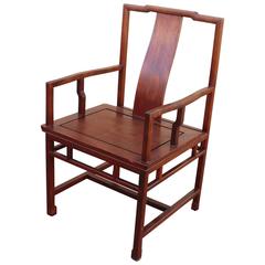 Chaise en bois de rose massif à dossier en forme d'étrier de style Ming