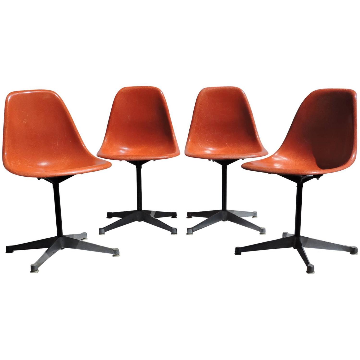 Eames for Herman Miller Orange Fiberglass Swivel Shell Chairs at 1stdibs