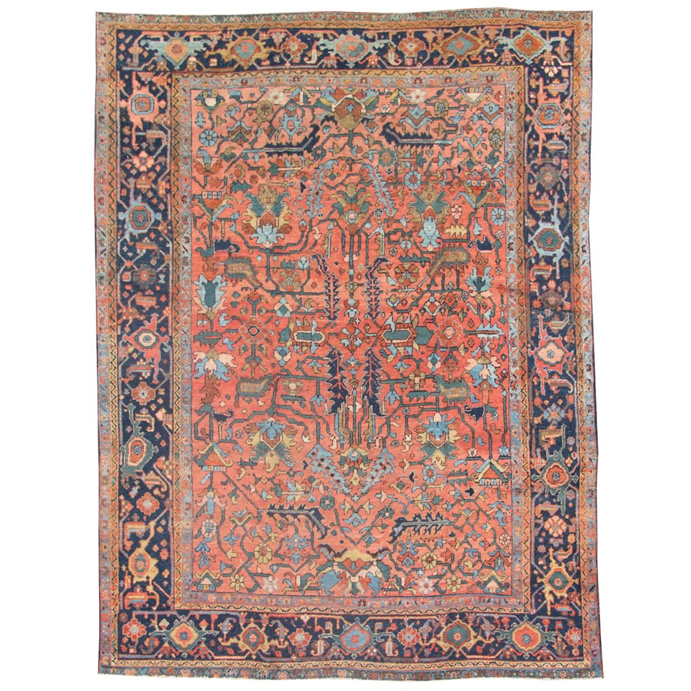 Early 20th Century Red and Indigo Heriz Carpet with Palmettes and Blossoms