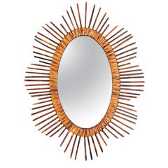 French Riviera Mid-20th Century Rattan Starburst Oval Mirrors 1