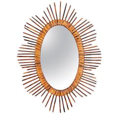 French Riviera Mid-20th Century Rattan Starburst Oval Mirrors