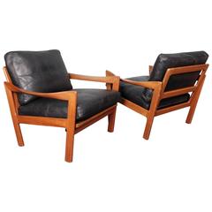 Illum Wikkelsø, a Pair of Teak and Leather Danish Lounge Chairs