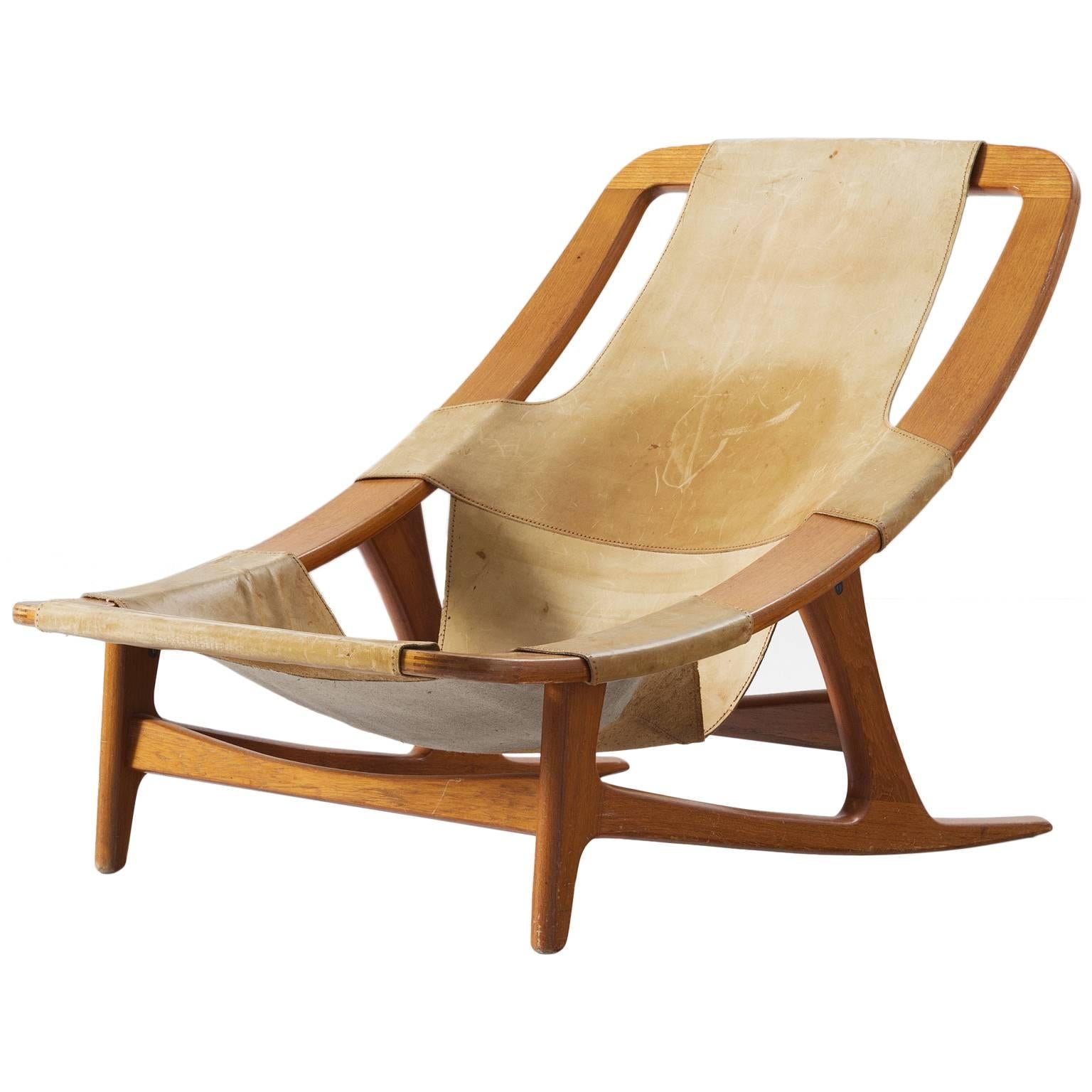 Arne Tidemand Ruud Lounge Chair in Teak and Natural Leather