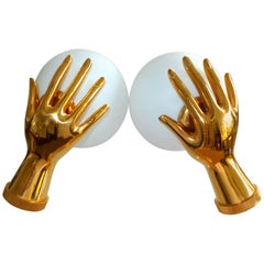 Pair of Arlus Gilt Brass Hands with Opaline Globes Sconces