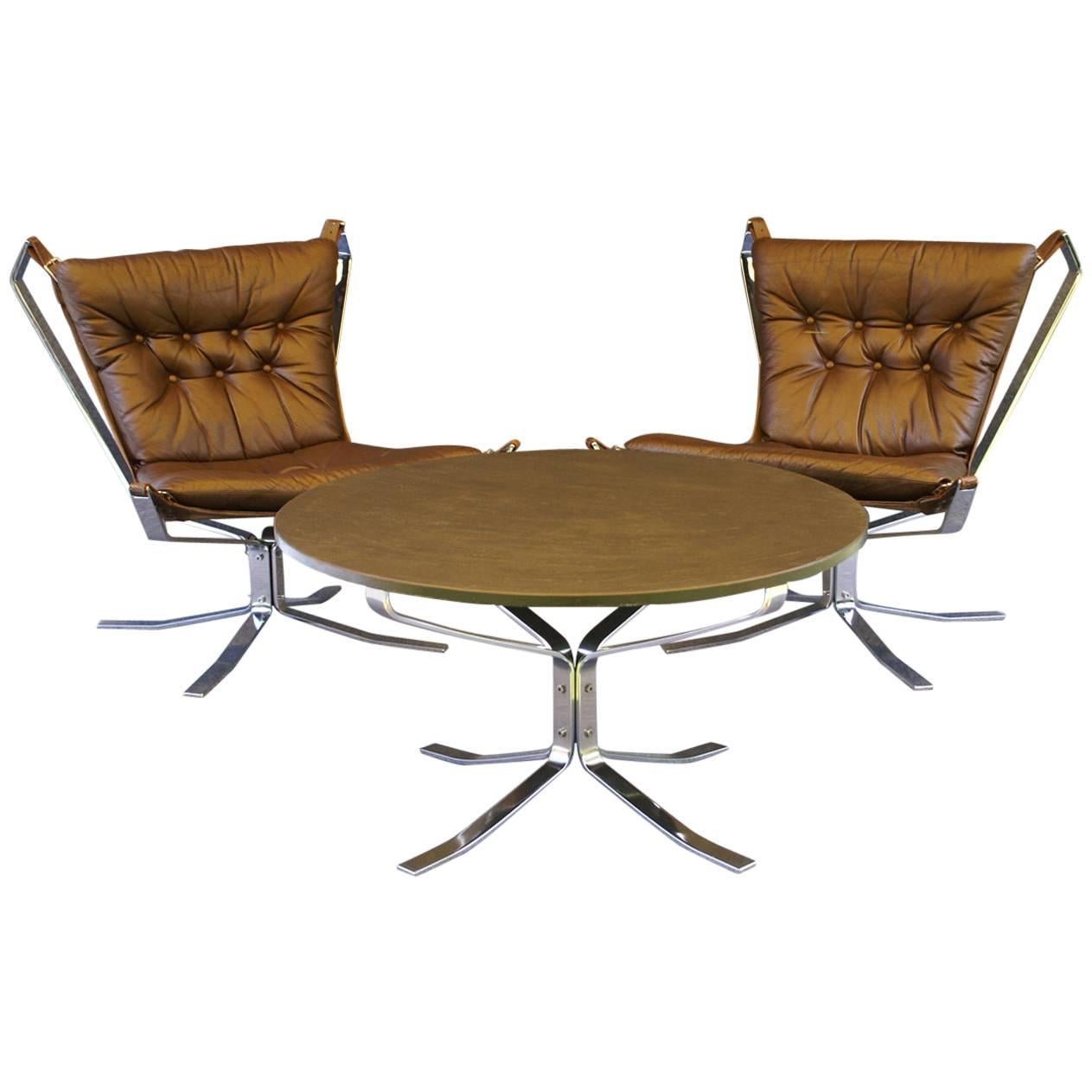 Pair of Leather and Chrome Falcon Chairs and Coffee Table by Sigurd Ressell
