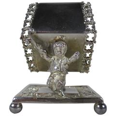 Antique Victorian Scrolled Silver Plate Boy Carrying a Standing Napkin Ring