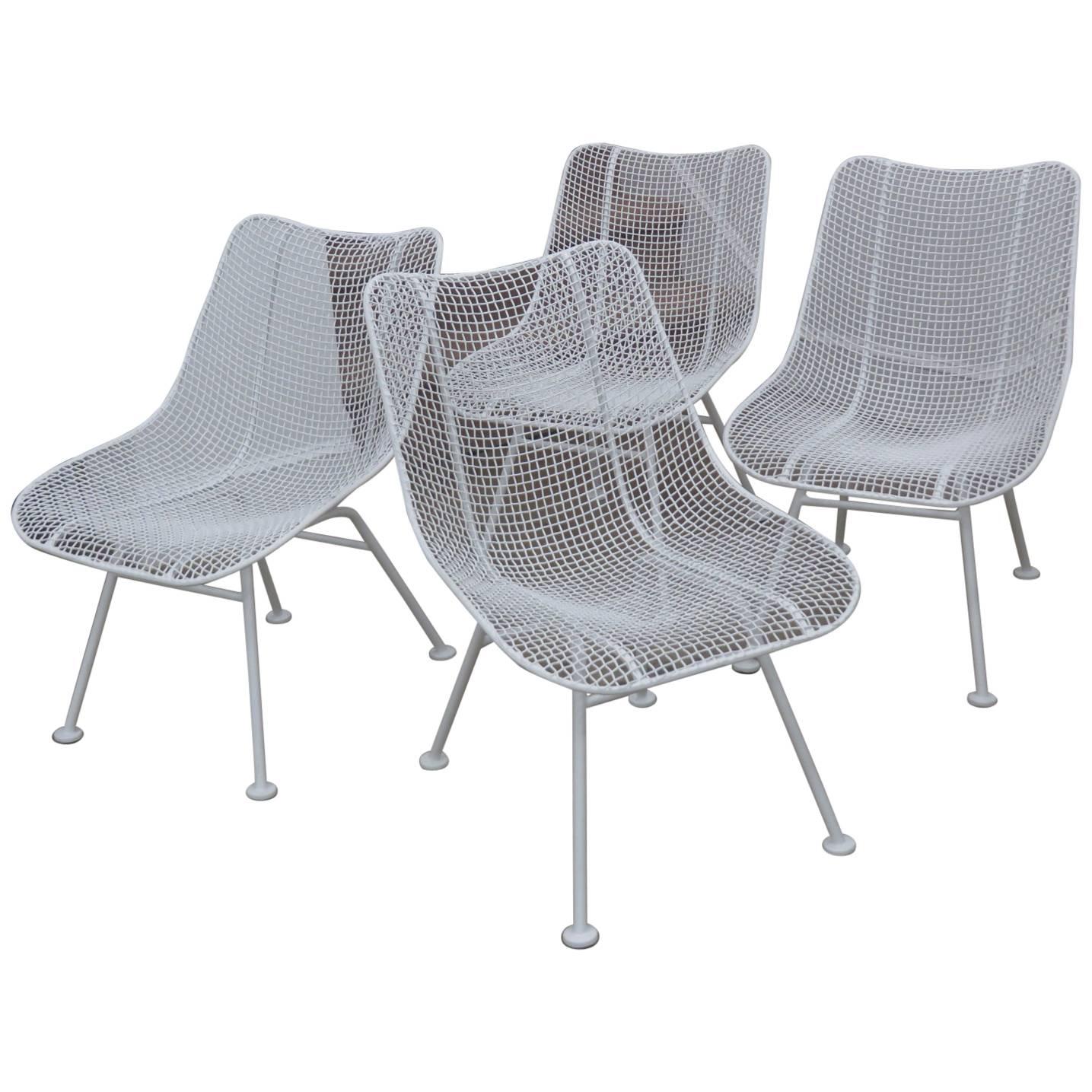 Set of Four 1950s Russell Woodard Iron Mesh Lounge Chairs For Sale