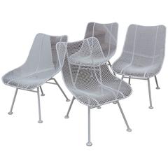 Set of Four 1950s Russell Woodard Iron Mesh Lounge Chairs