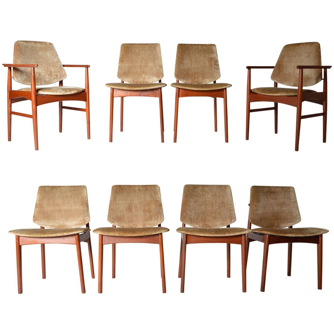 Eight Danish Modern Teak Dining Chairs in the Manner of Arne Hovmand Olsen