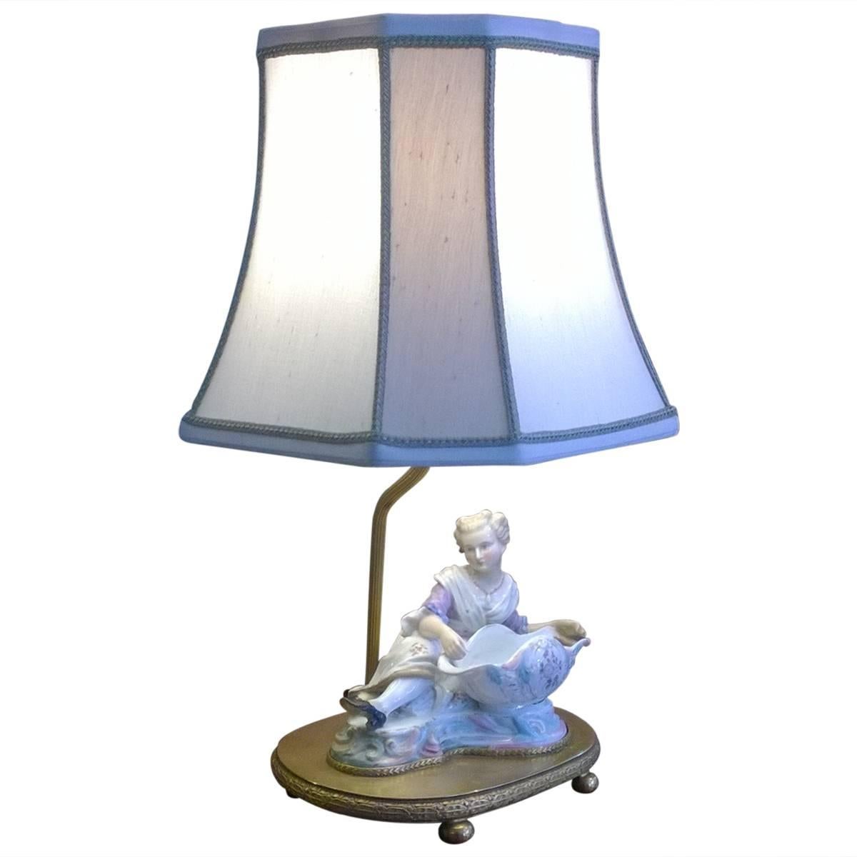Porcelain Table Lamp in the Form of a Reclining Female Figure For Sale