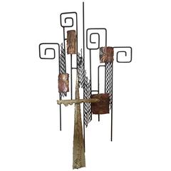 A Mixed Metal Wall Sculpture in the Manner of Curtis Jere 1