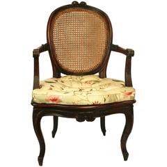Louis XV Carved and Caned Fauteuil en Cabriolet, c1750