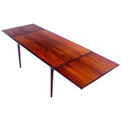 Danish Modern Rosewood Draw-Leaf Dining Table Designed by Omann Jun Danish Modern Rosewood Draw-Leaf Dining Table Designed by Omann Jun