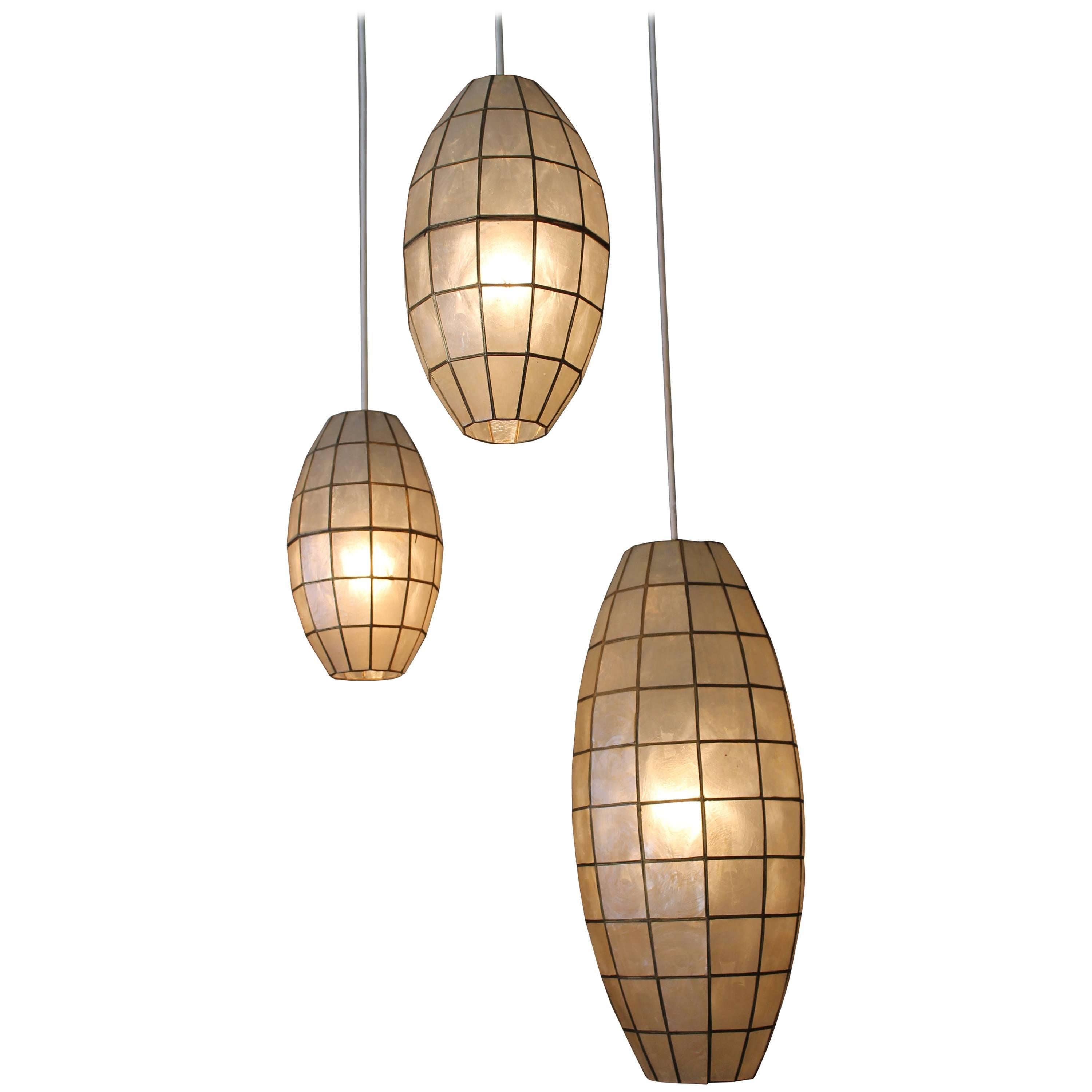 Mid-Century Capiz Shell Triple Chandelier at 1stDibs | capiz lampshade, capiz  light pendant, capiz shell lantern