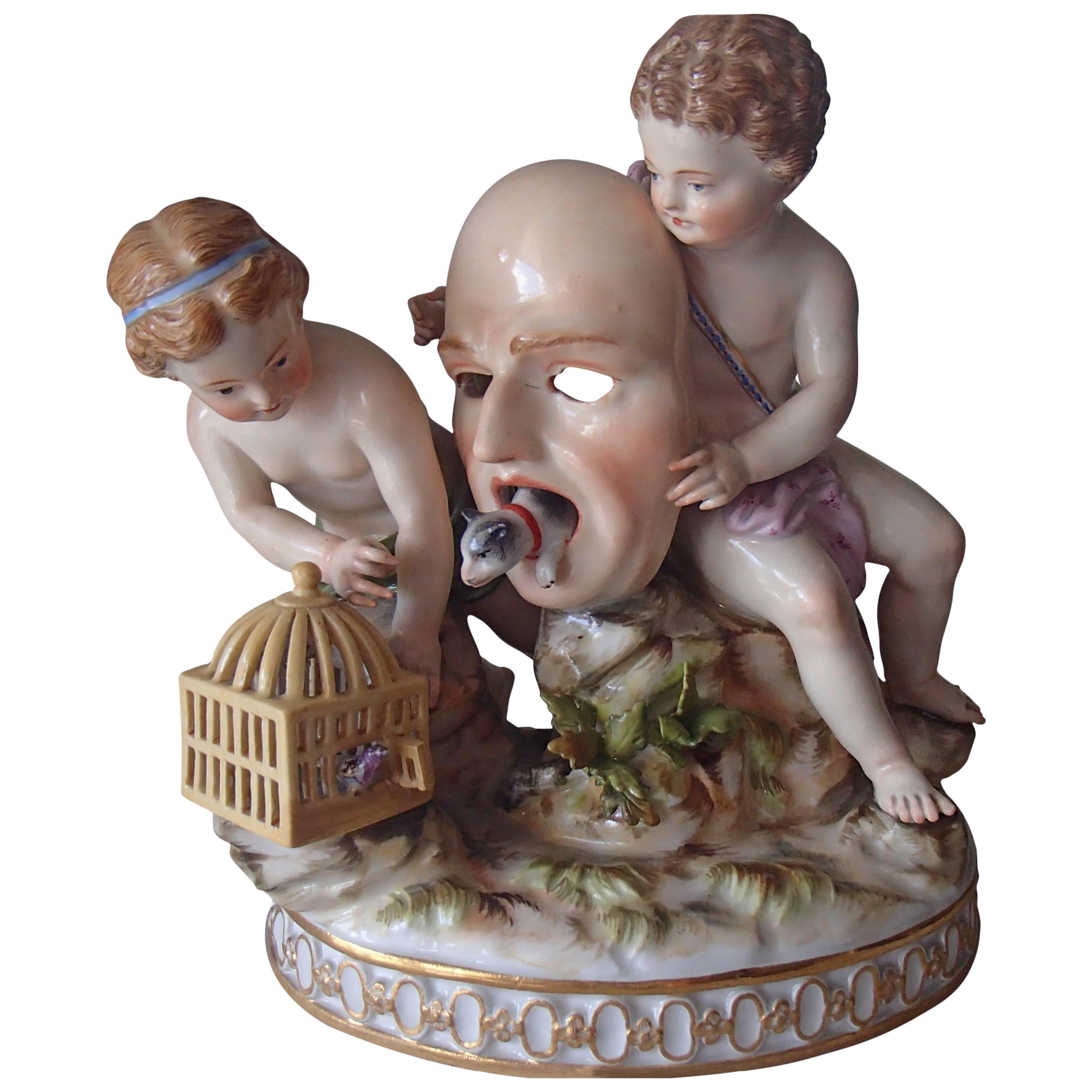 19th Century Meissen Figurines Two Putts Holding a Mask and Birdcage For Sale