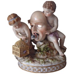 Antique 19th Century Meissen Figurines Two Putts Holding a Mask and Birdcage