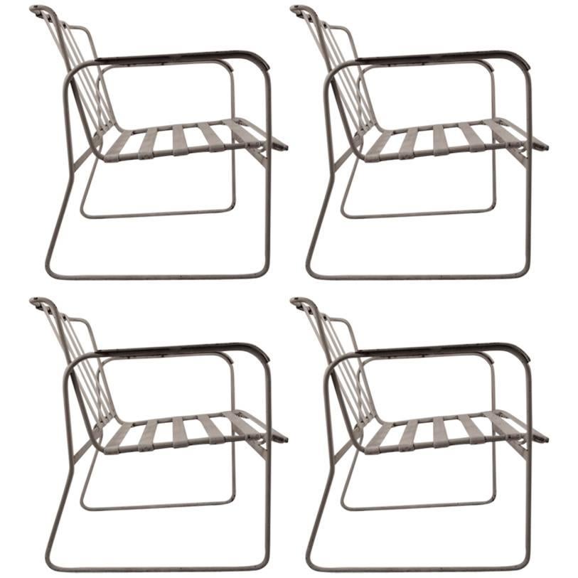 Set of Four Wrought Iron and Plastic Strap Garden Patio Chairs For Sale