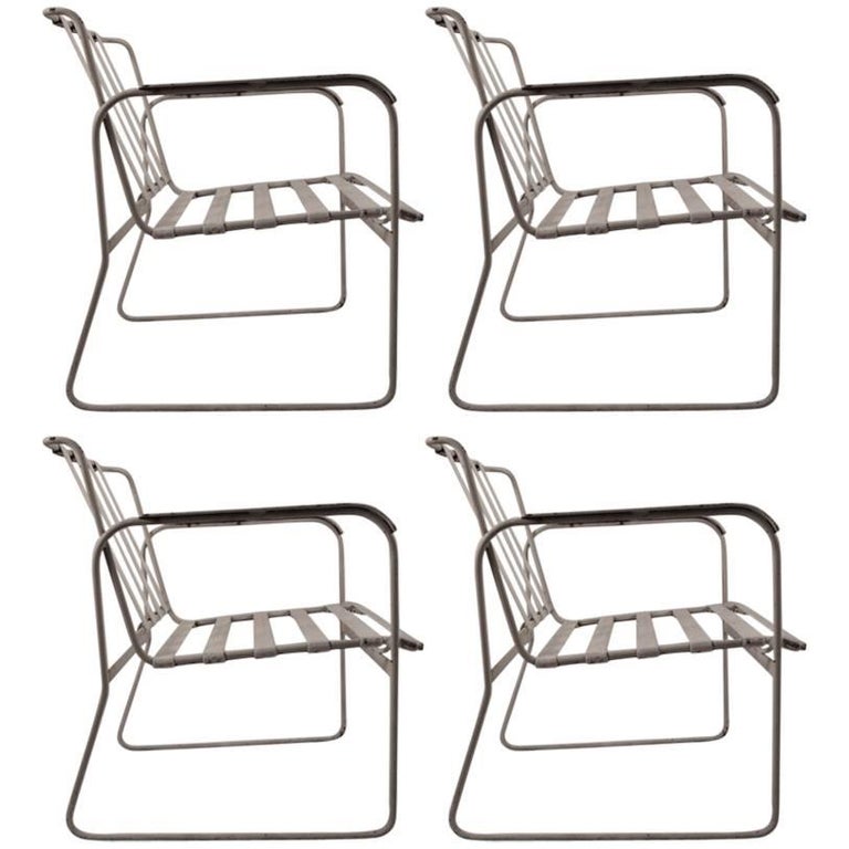 Set Of Four Wrought Iron And Plastic Strap Garden Patio Chairs For