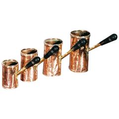 Set of Four Mid-19th Century Copper Measuring Jugs
