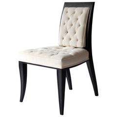 Arbus Chair in ebonized wood and upholstered pad.