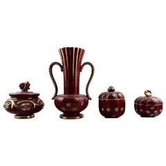 Collection of 'Red Rubin' Pottery with Red Glaze with Gold, Upsala-Ekeby, Gefle