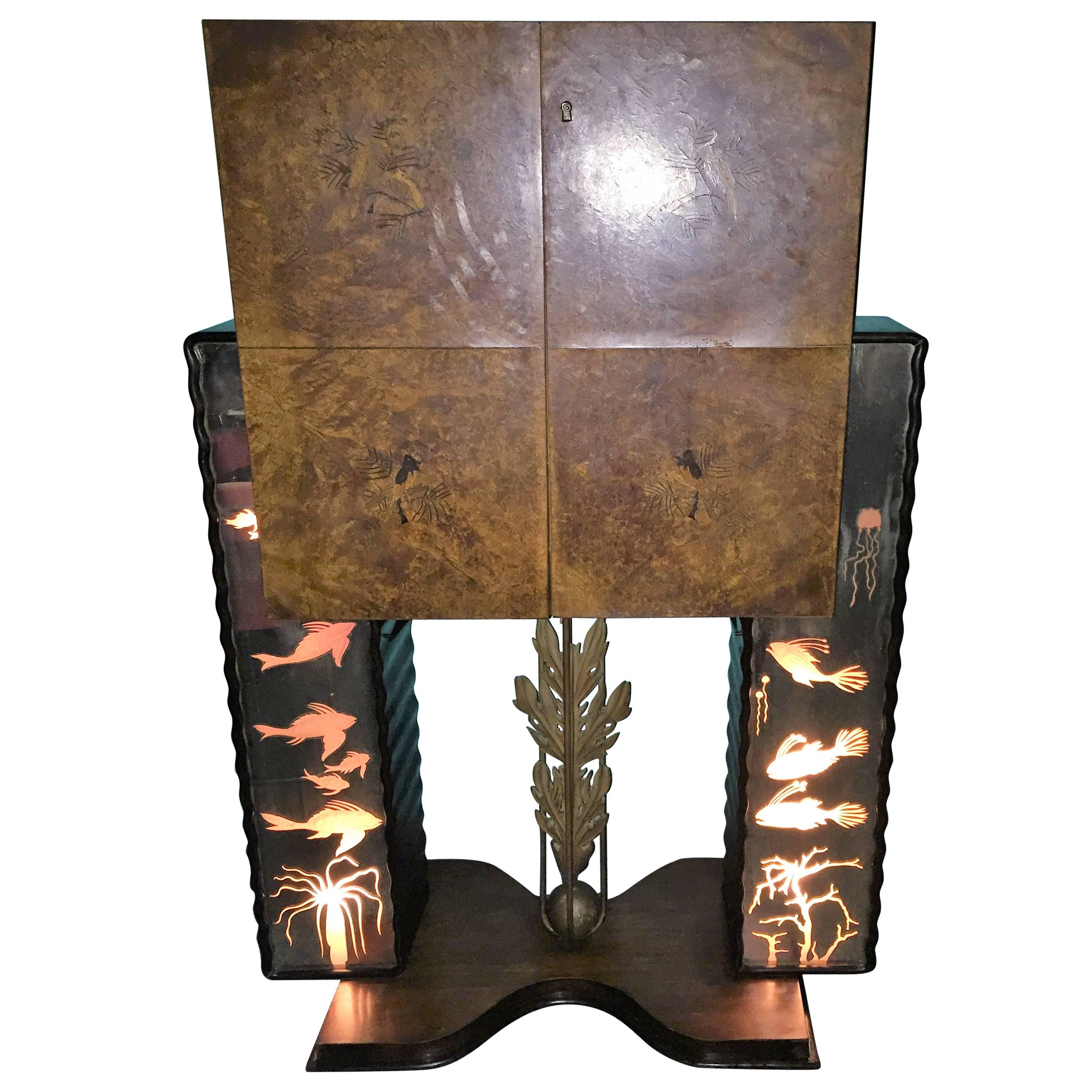 A fantastic ethereal Italian bar with illuminated mirrored panels exhibiting mysterious sea life with two push in switches located on the sides. In the center of these panels is a hand-carved wooden ball and coral motif surrounded by metal tendrils.