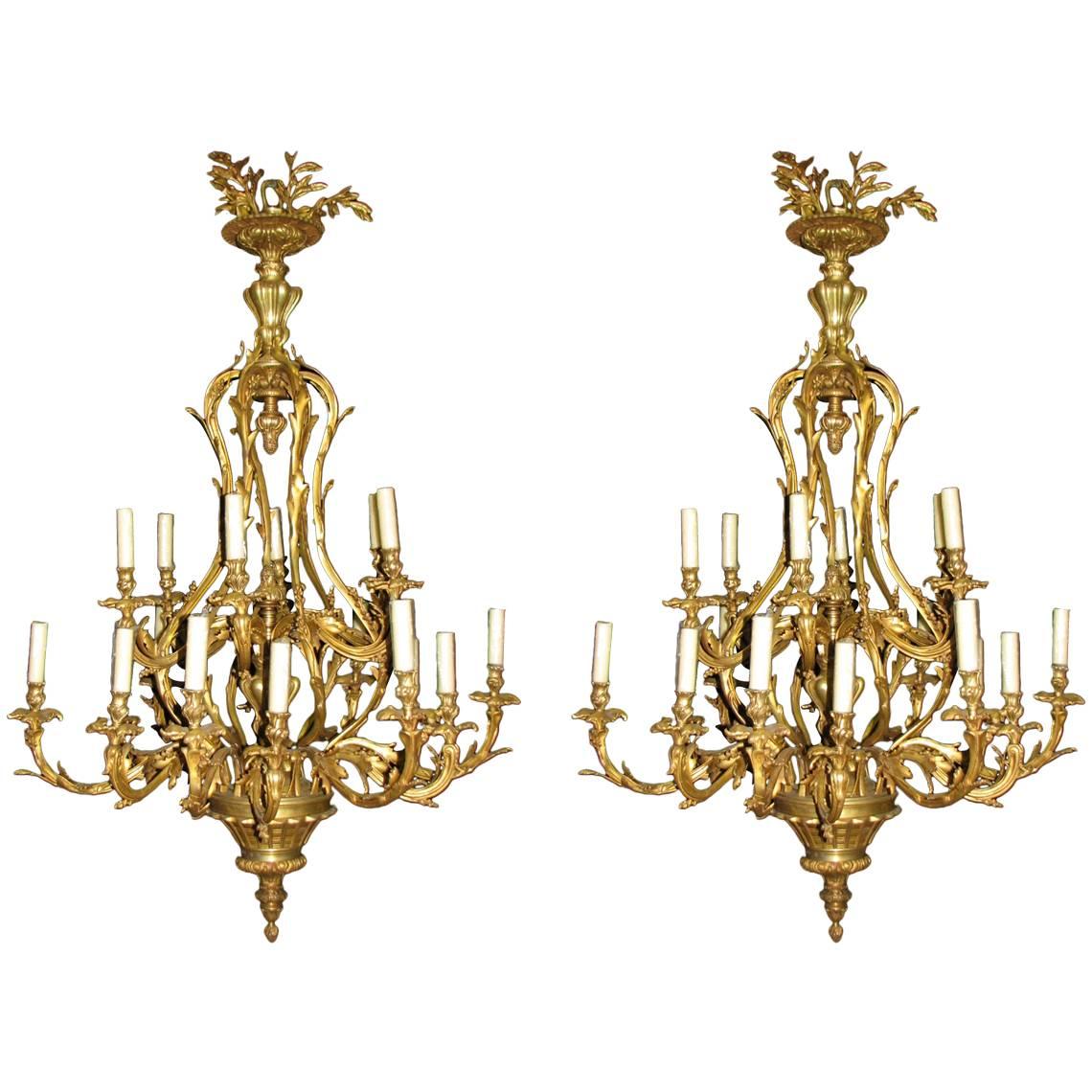 Pair of Louis XV Style Bronze Eighteen-Light Chandeliers
