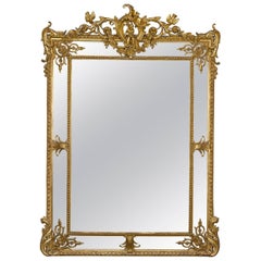 Miroir en bois doré Louis XV Revive
