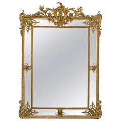 Miroir en bois doré de style néo- Louis XV