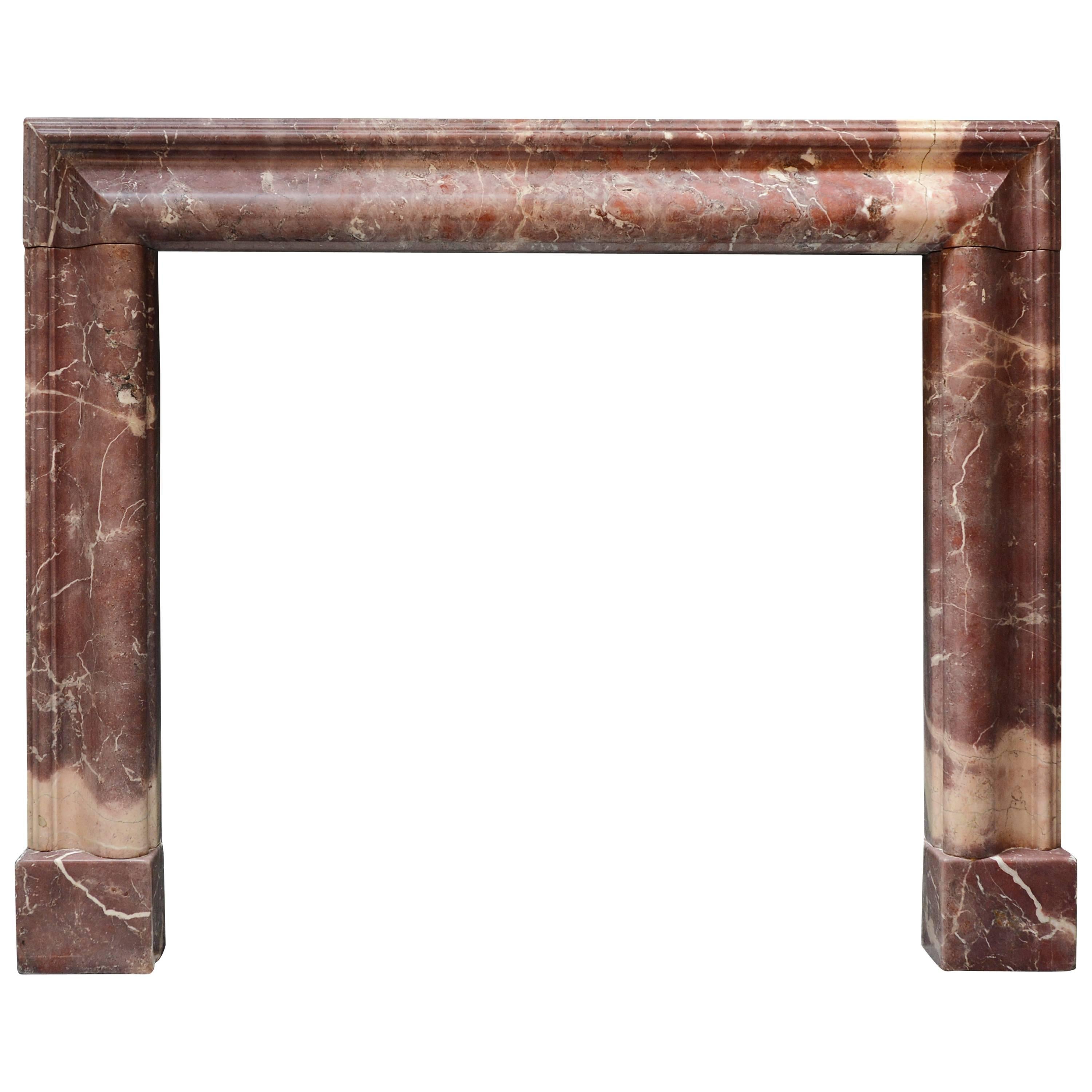 Early Nineteenth Century Fleur de Peche Marble Bolection Chimneypiece