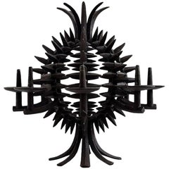 Jens Quistgaard, a Circular, Pineapple Shaped Candlestick of Iron