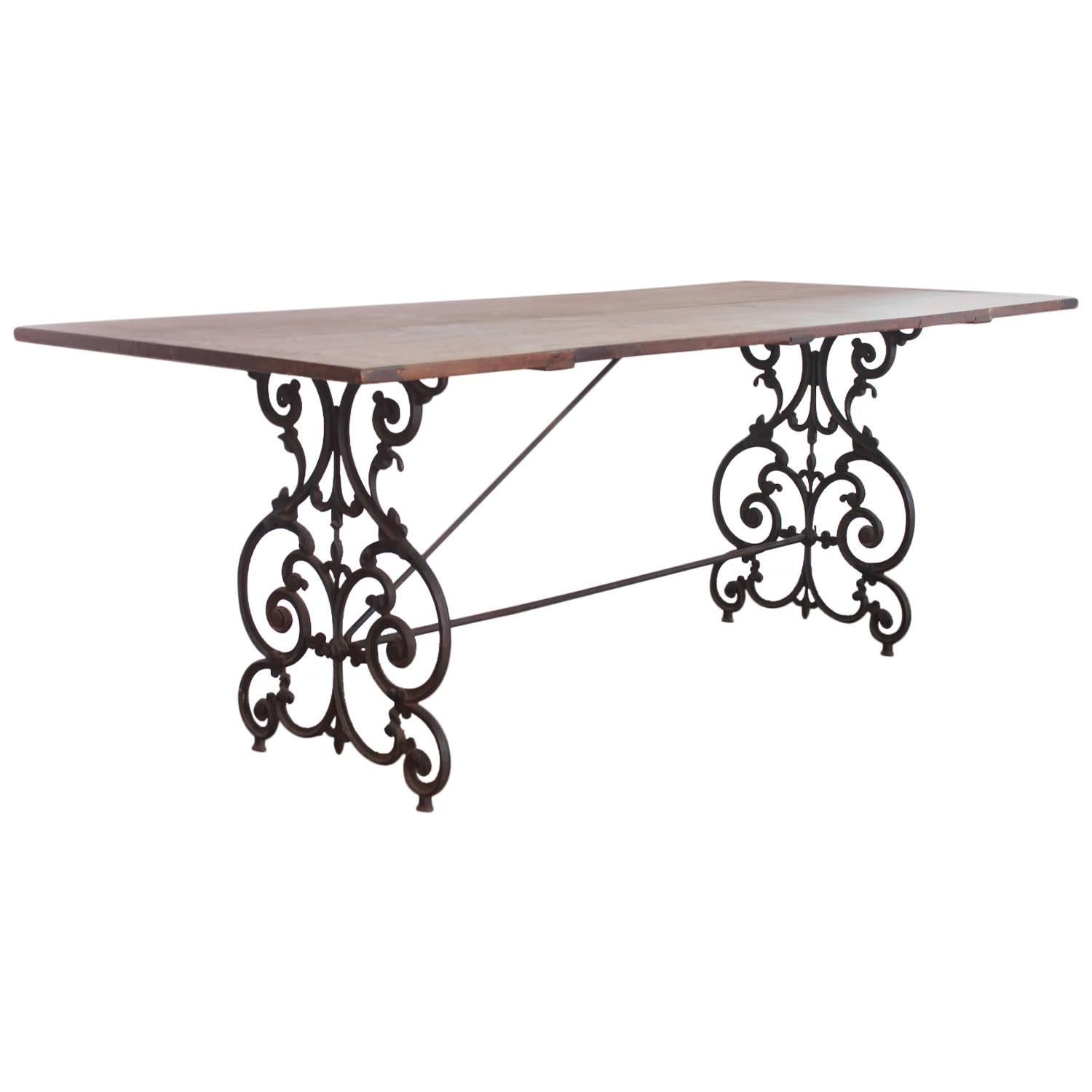 American Wrought Iron and Wood Base Dining Table, circa 1900s