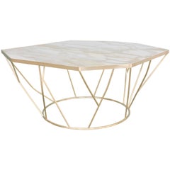 Facet Sculptural Cocktail Table in Satin Bronze with Inset Honed Marble Top.