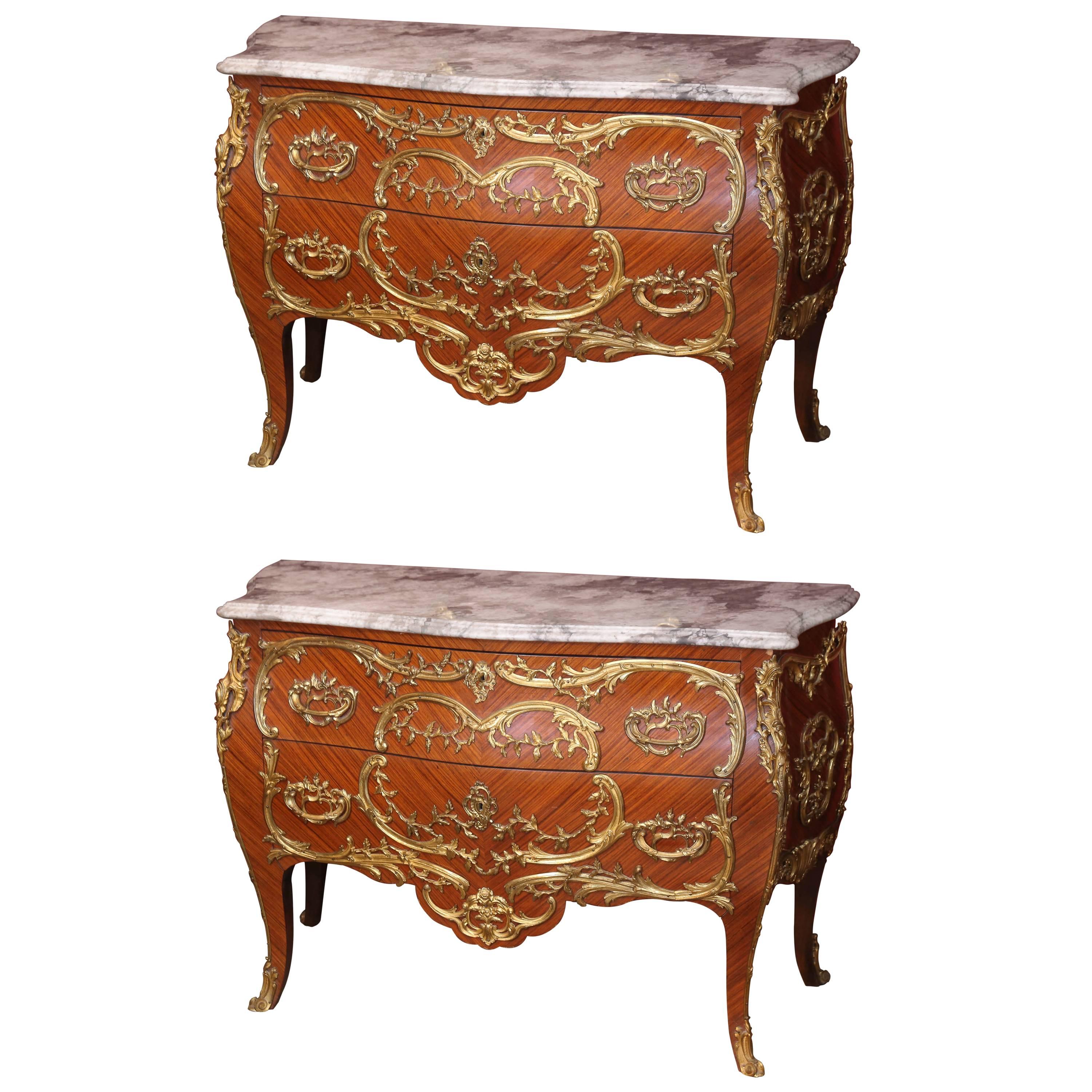 Pair of French Commodes with Marble Tops and Extensive Ormolu Mounts For Sale