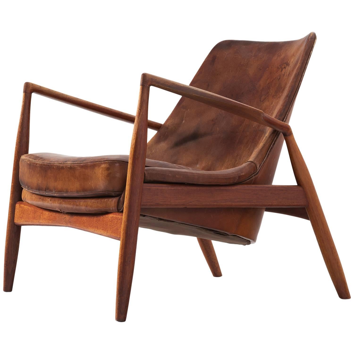 Ib Kofod-Larsen 'Seal' Lounge Chair in Patinated Cognac Leather