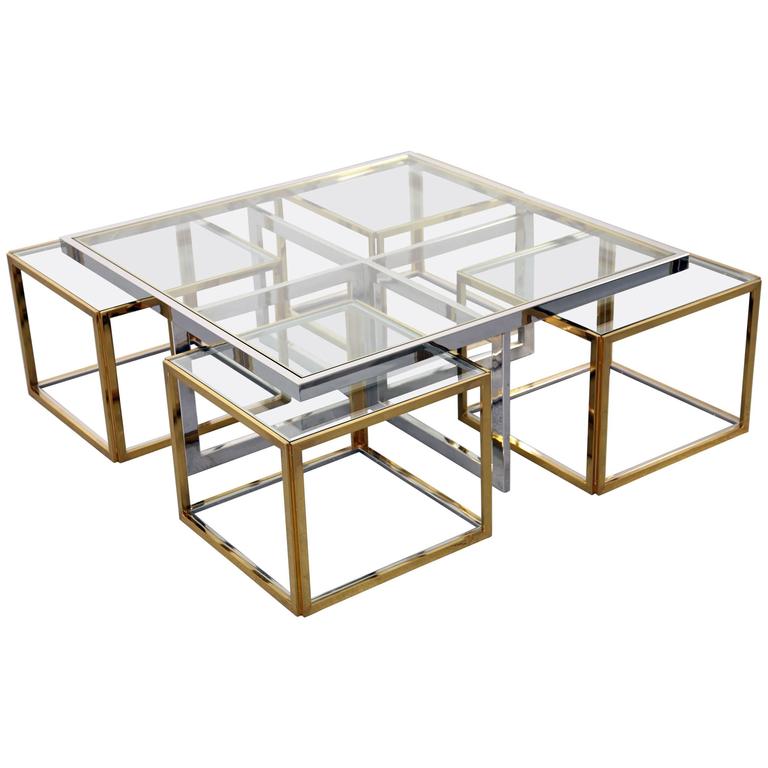 Chrome Coffee Table with Four Brass Nesting Tables by Maison Charles at 1stDibs