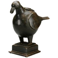 An Indian Patinated Bronze Sculpture of a Bird