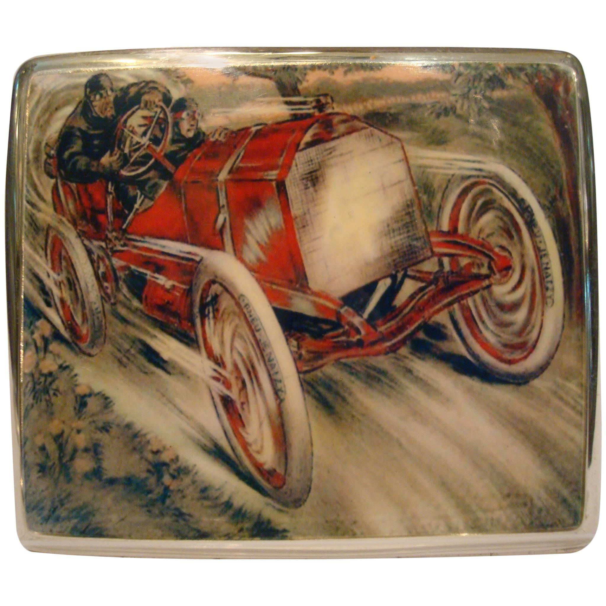 Racing Chain Car 'Pneus Jenatzy' Silver and Enamel Cigarette Case, circa 1903