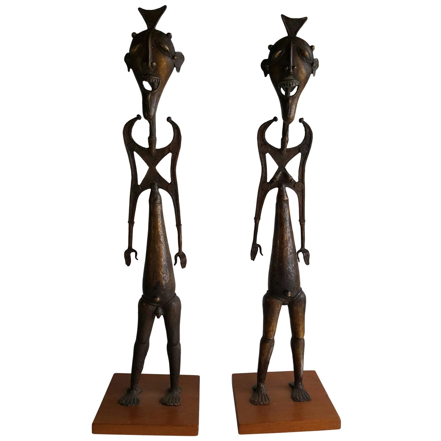 Modernist Bronze African Statues of Whimsical Man and Women For Sale at