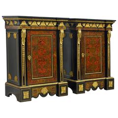 Pair of Napoleon III Ebonized and Ormolu-Mounted Boulle Style Cabinets