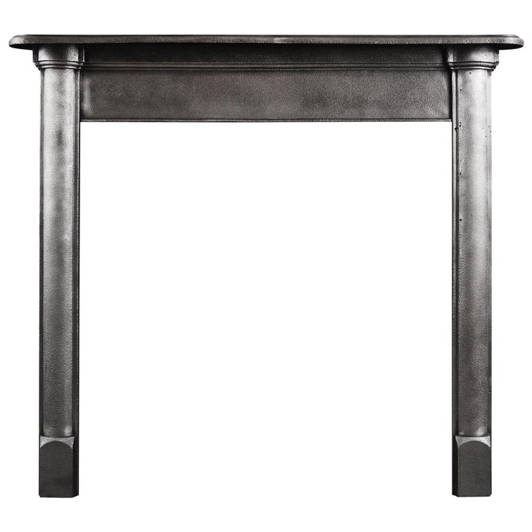 Simple Polished Cast Iron Fireplace For Sale at 1stDibs