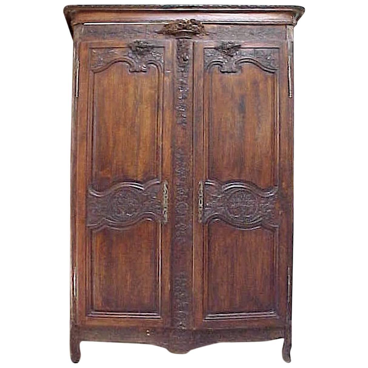 1700s French Country Highly Carved Walnut Wedding Armoire-Provenance For Sale